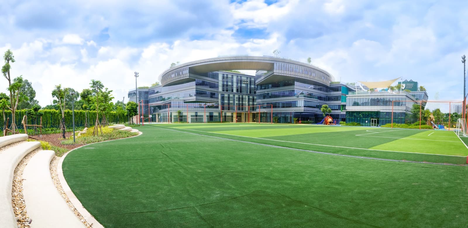 The artificial-turf pitch in front of the main building