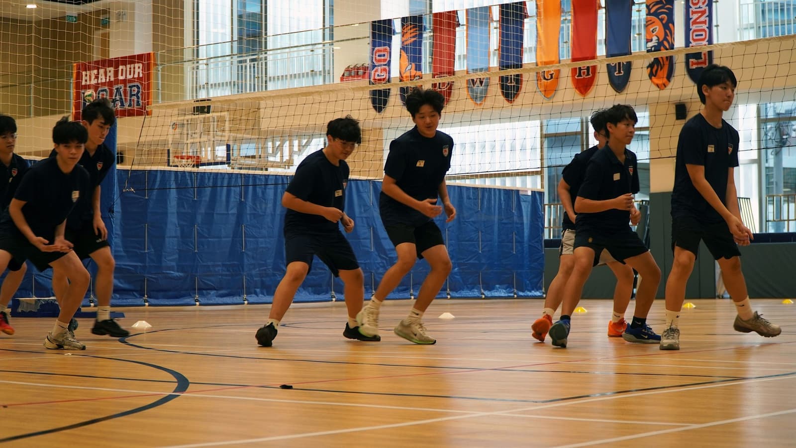 Students training in the indoor sports hall