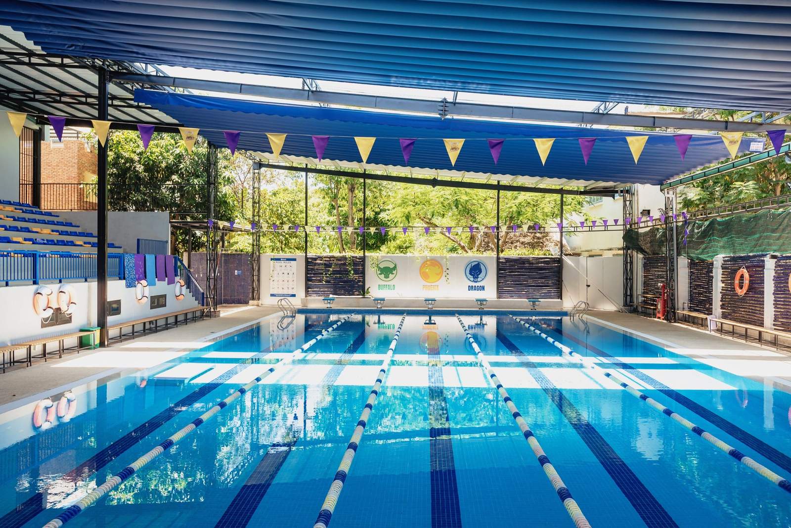 The covered swimming pool, with lane ropes and bunting